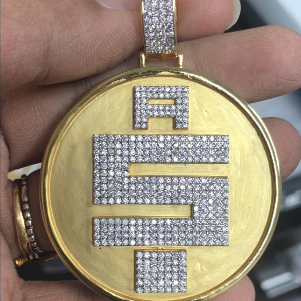 Gold finish pendant All money in